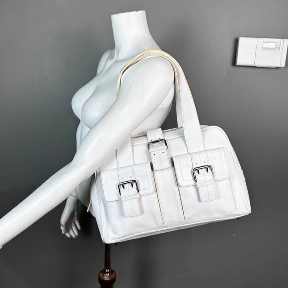 Furla top handle bag white leather buckle pockets coastal minimalist elevated